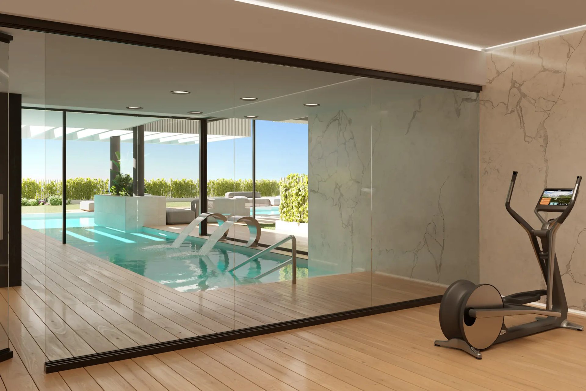 The covered pool, seen from the gym that shares the room with it. Almitak, Parque de las Lagunas, Mijas.