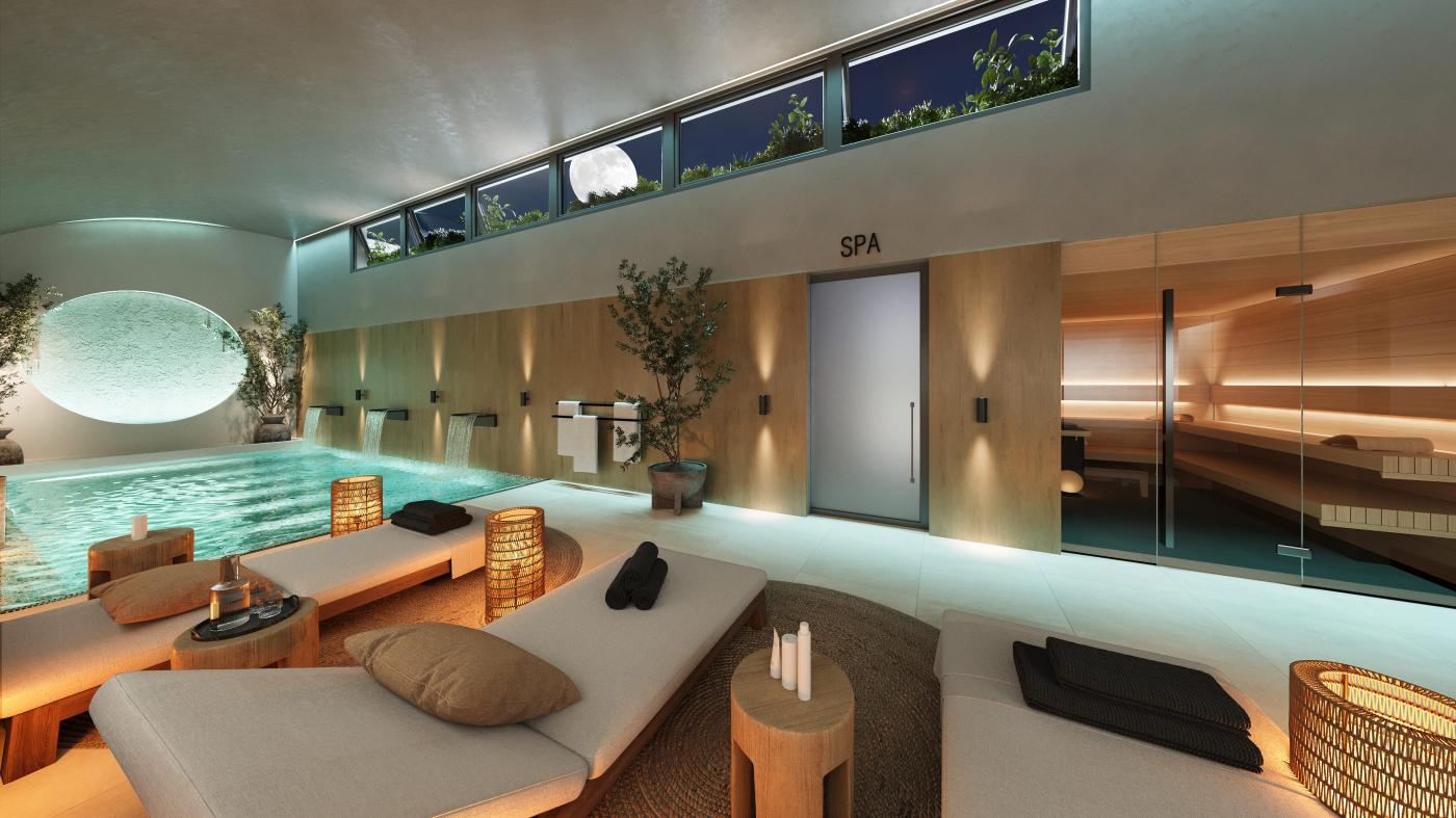The spa, with the heated indoor pool, loungers beside it and the sauna behind glass. Altos del Chaparral, El Chaparral, Mijas.