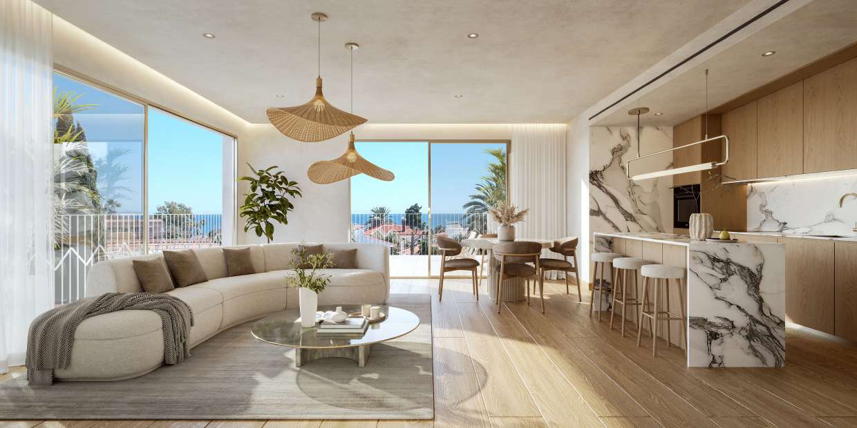 The living room and kitchen of an apartment, with the sea beyond the terrace. Art Marina, La Carihuela, Torremolinos.