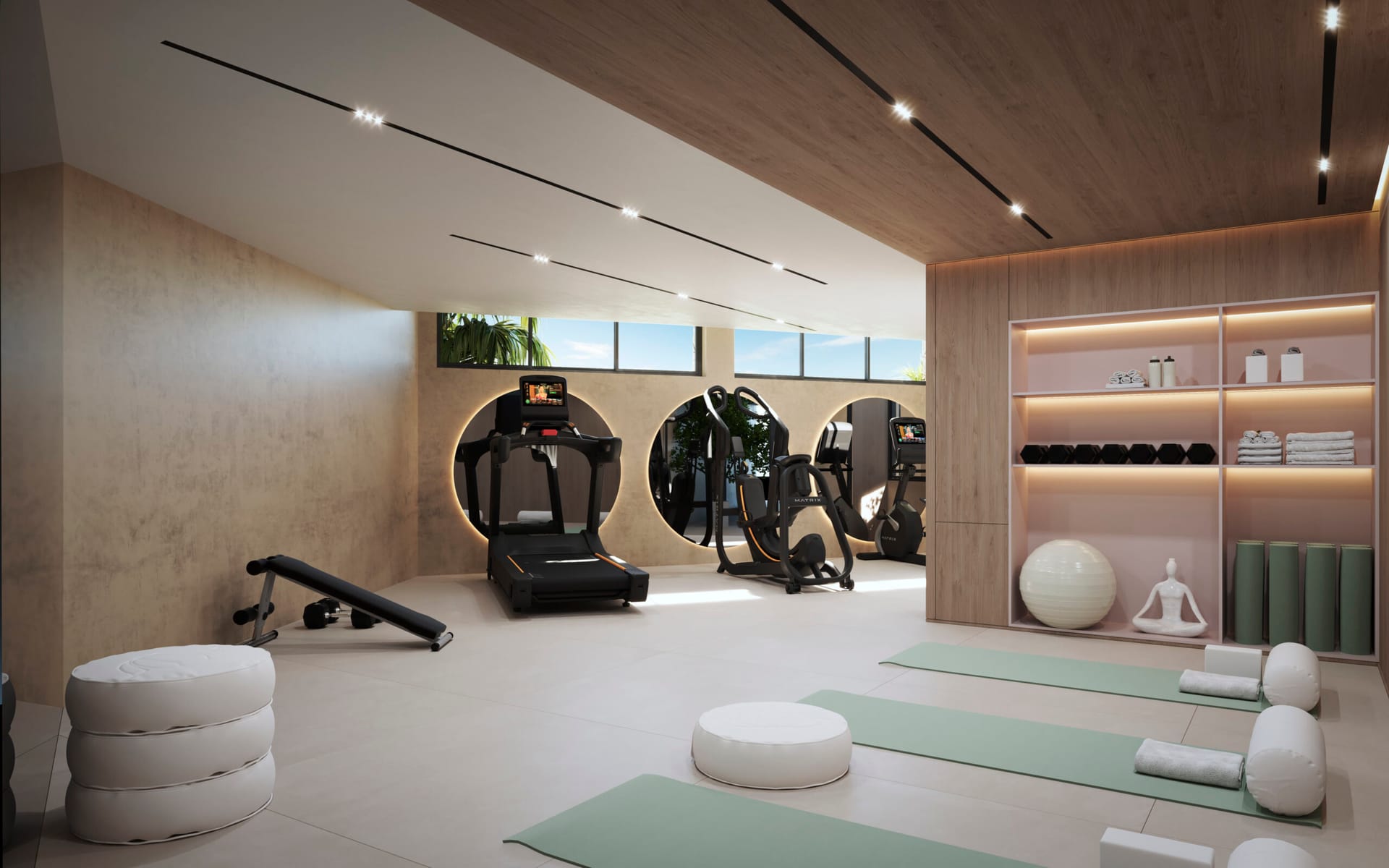 The gym, with room set aside for stretching and yoga. Aruna, Cabopino, Marbella.
