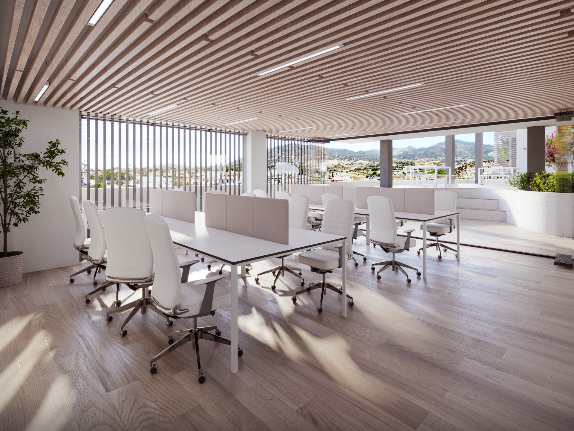 The coworking room, with shared desks, task chairs and a timber-slatted ceiling. Astra Homes, Los Pacos, Fuengirola.