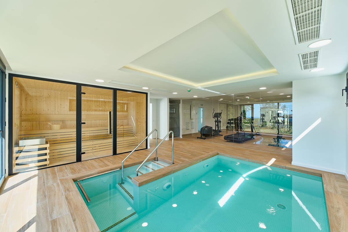 The heated indoor pool, with the sauna beside it. Aura Higuerón, El Higuerón, Fuengirola.
