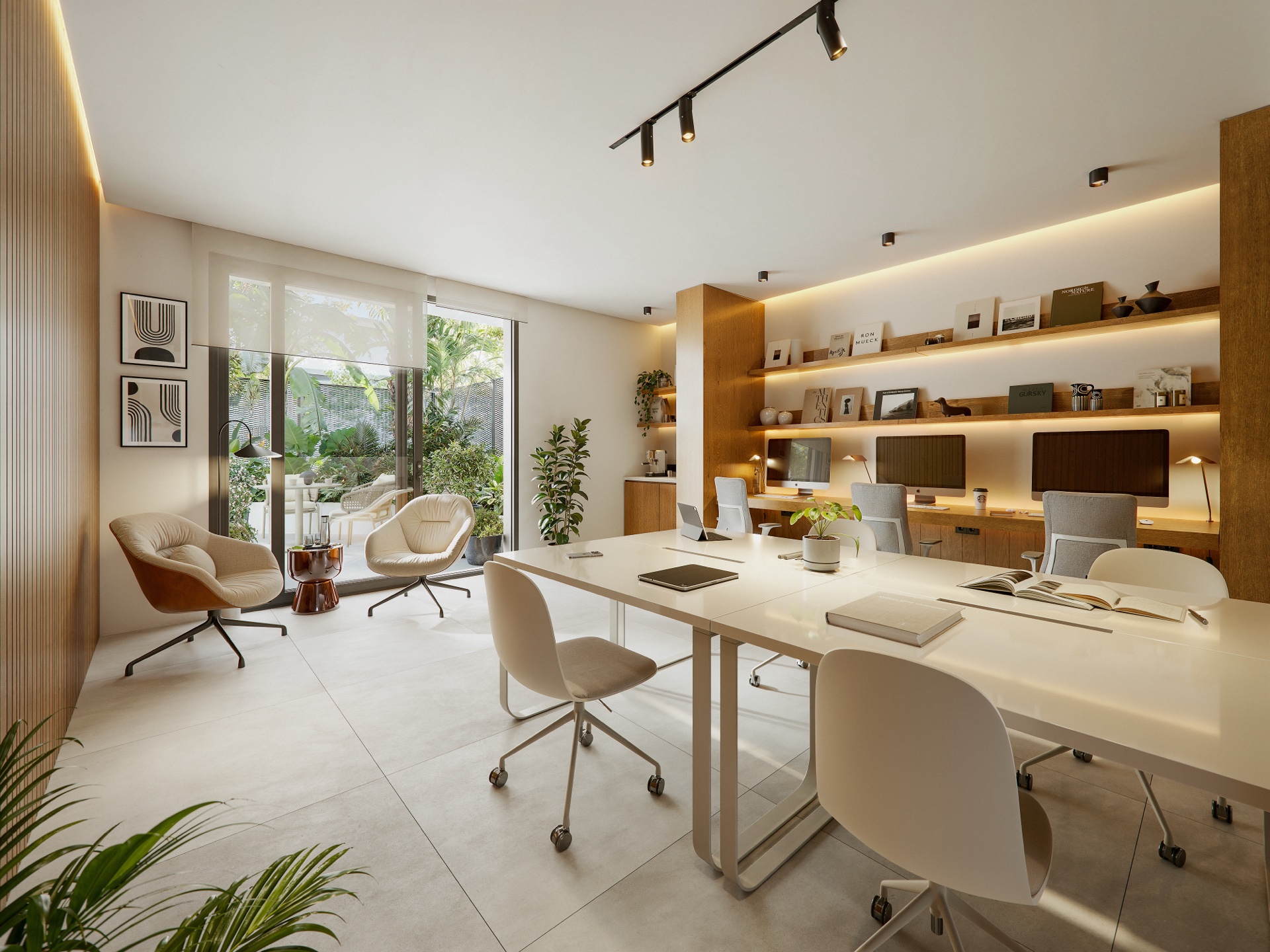 The coworking space, with desks, a meeting table and a private terrace beyond the glass doors. Azure Living, Avenida del Mediterráneo, Torre del Mar.