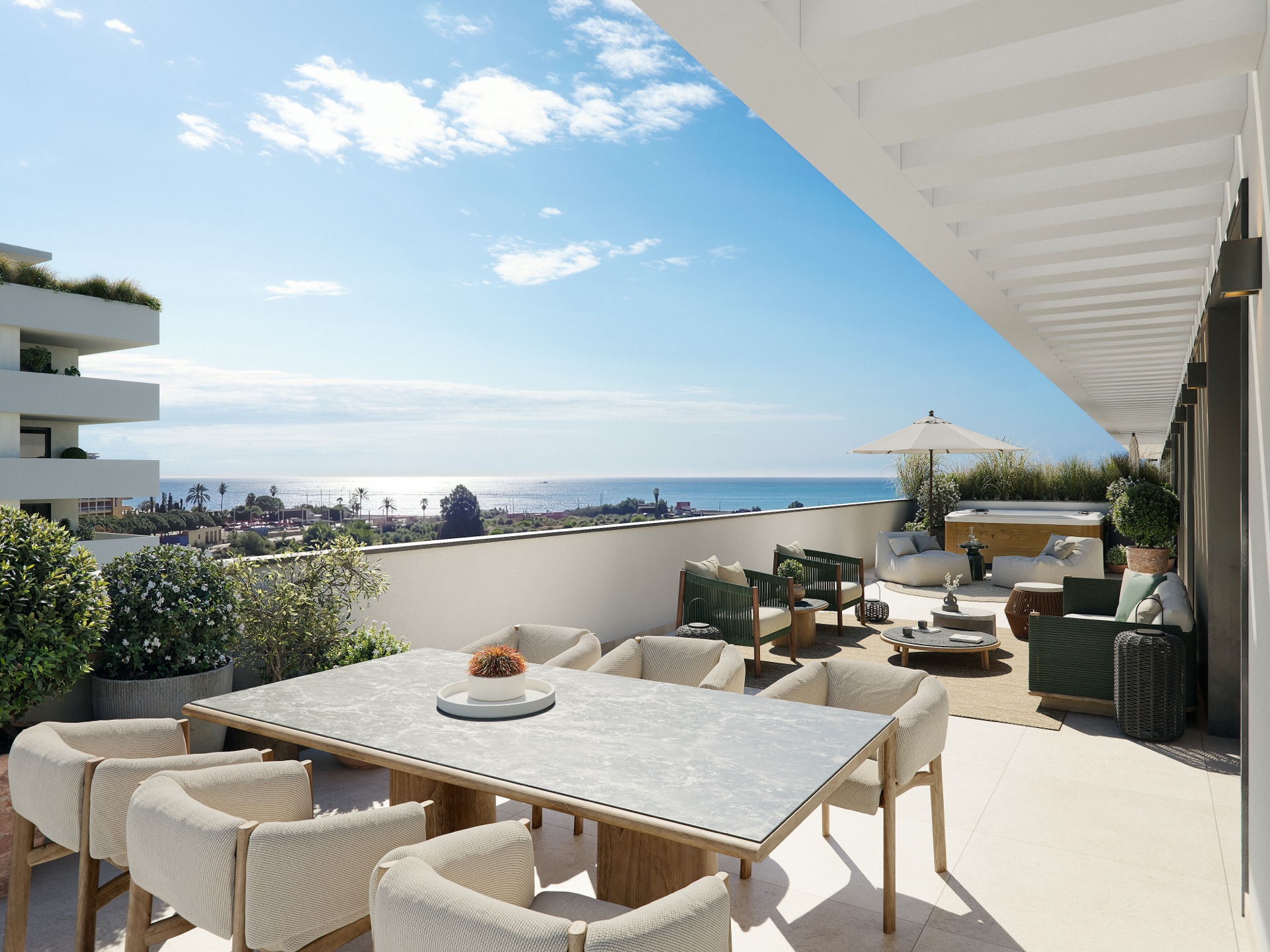 A penthouse terrace, with a dining table, a lounge area, a private jacuzzi and open sea views. Azure Living, Avenida del Mediterráneo, Torre del Mar.