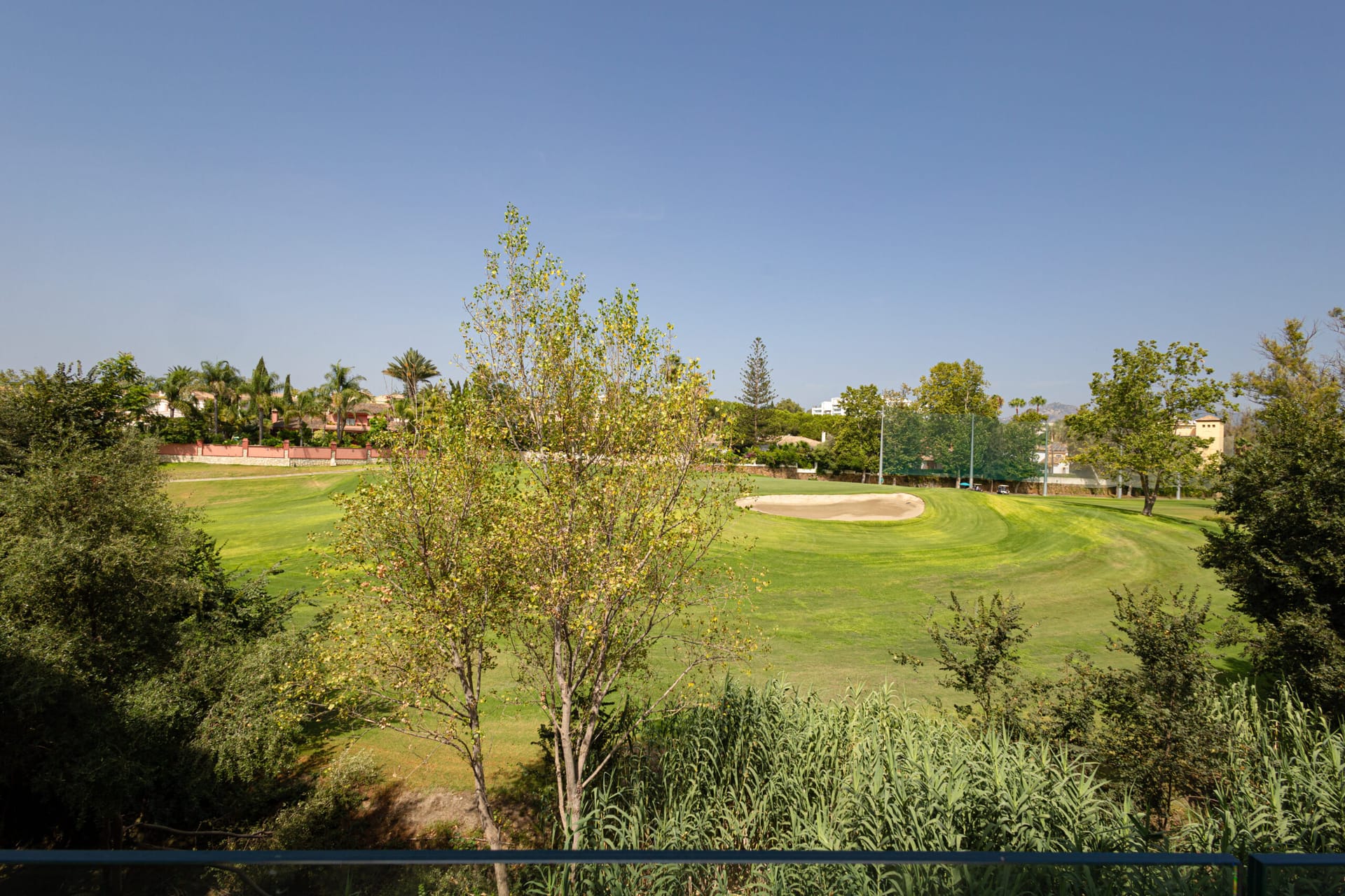 The view from a terrace across the Guadalmina golf course. Breeze, Guadalmina Alta, Marbella.