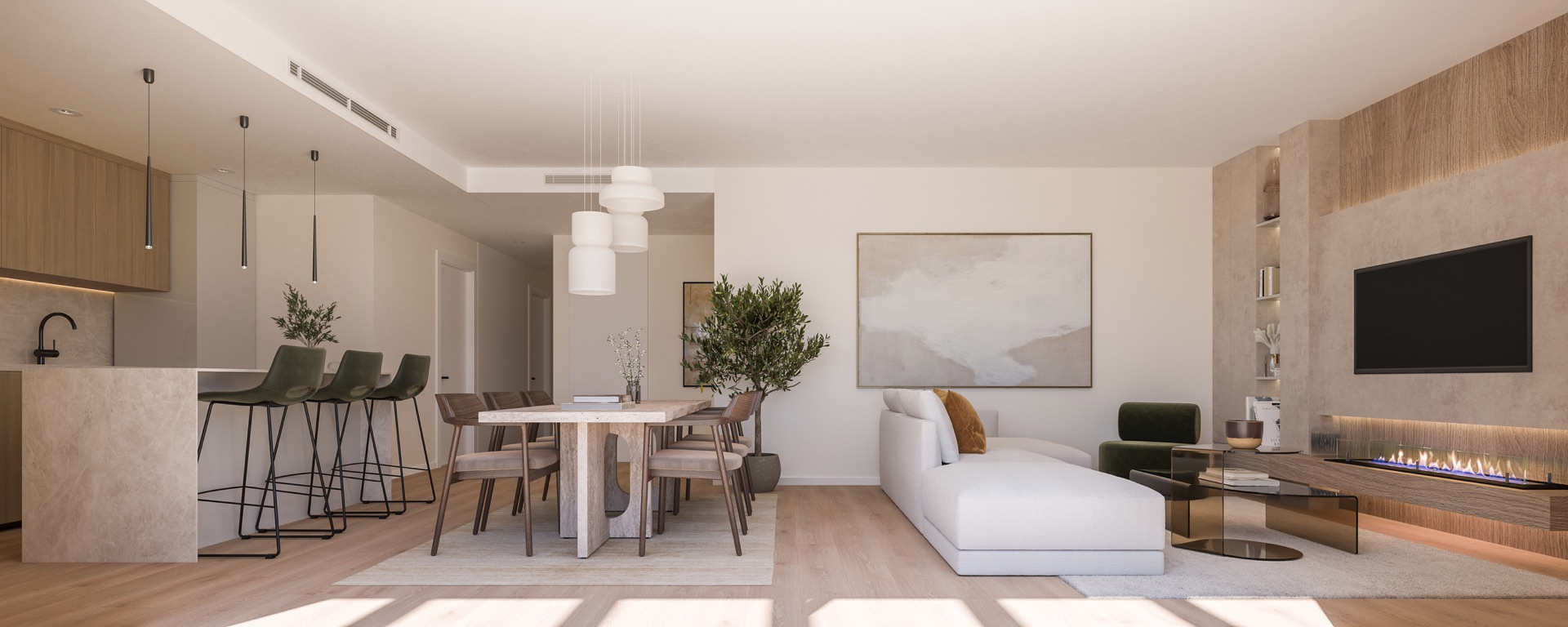 A living room open to the kitchen, with a dining table and a breakfast bar. Capri, La Resina, Estepona.