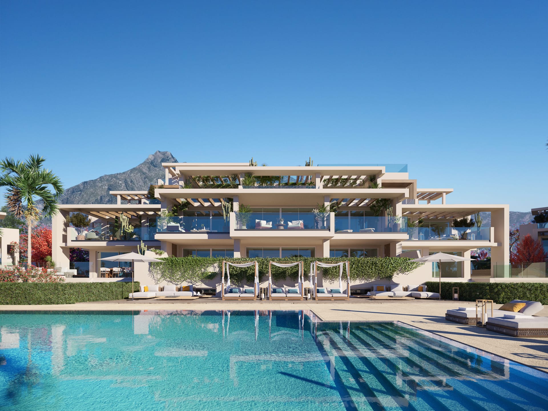 The outdoor pool, with the apartments above it and La Concha behind. Earth, Golden Mile, Marbella.