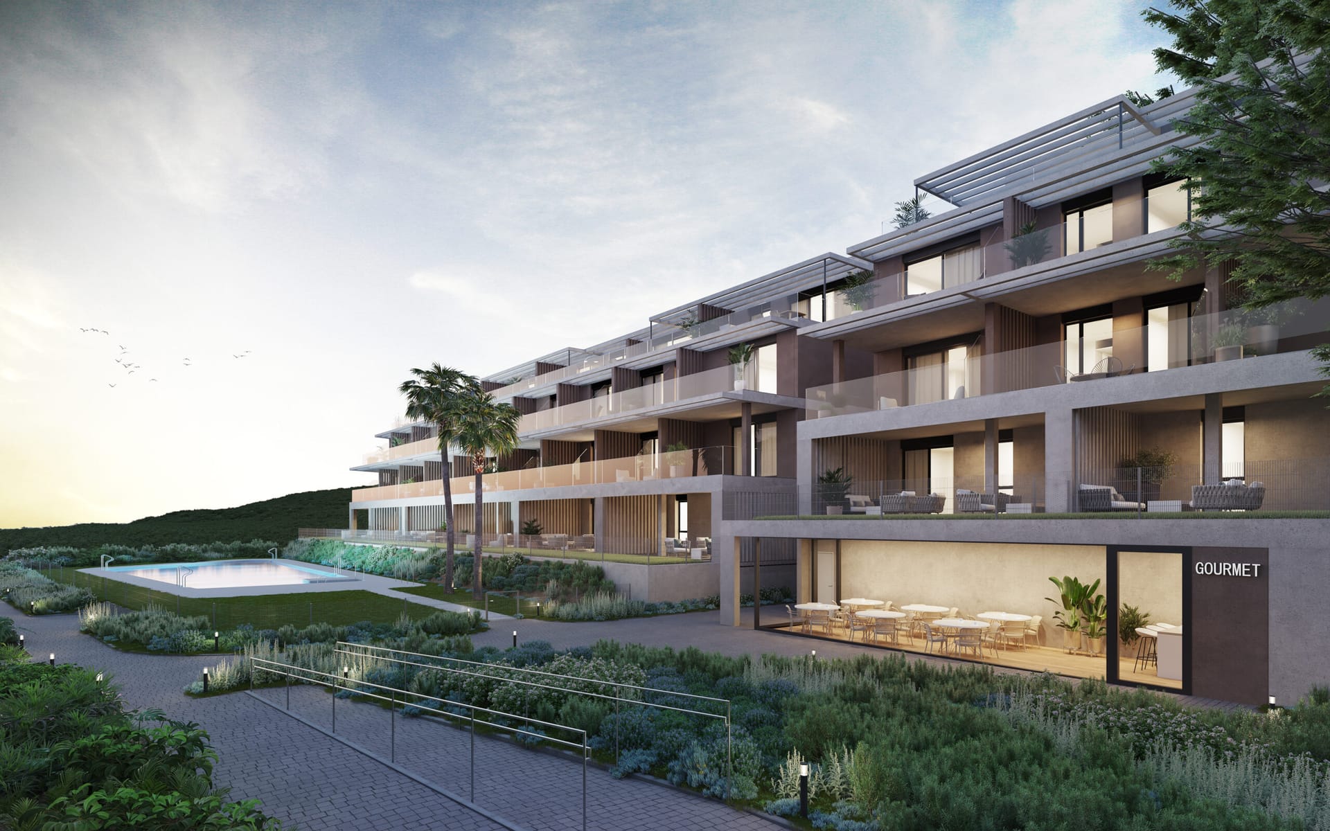 The glass-fronted gourmet room, with the pool and gardens beyond. Etherna Homes II, Valle Romano, Estepona.