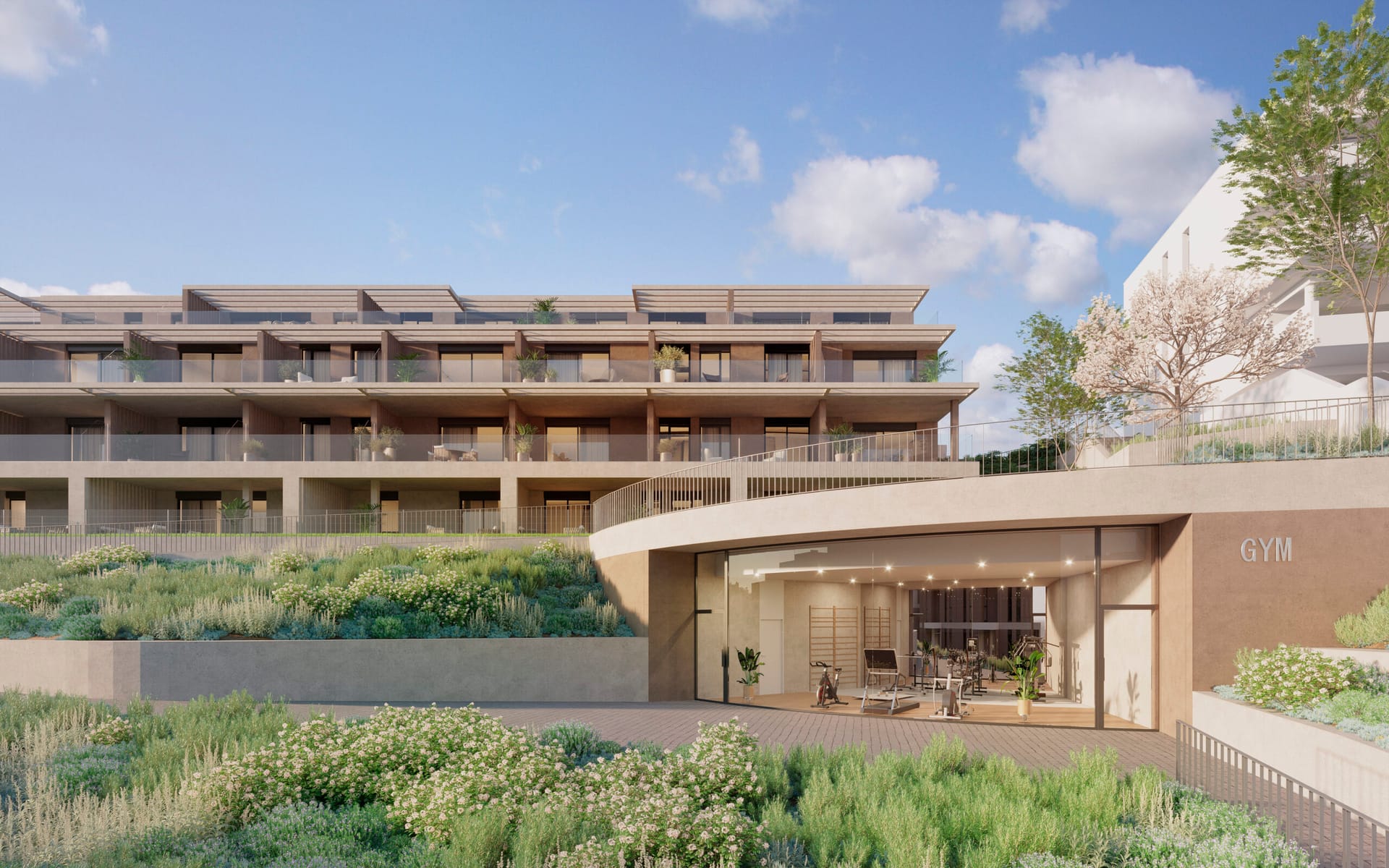 The gym, set into the planted slope below the buildings. Etherna Homes II, Valle Romano, Estepona.