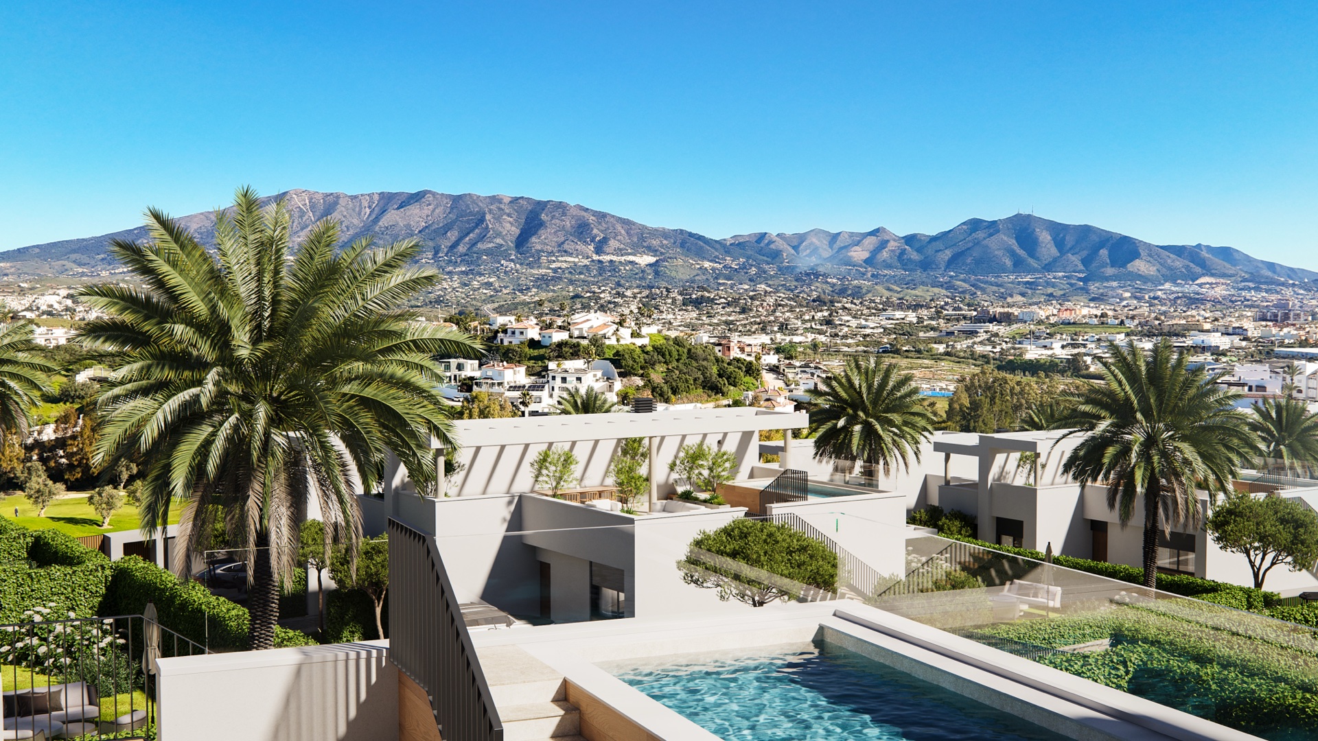 A rooftop solarium and its pool, looking across the town towards the mountains. Green Valley, Cerrado del Águila, Mijas.