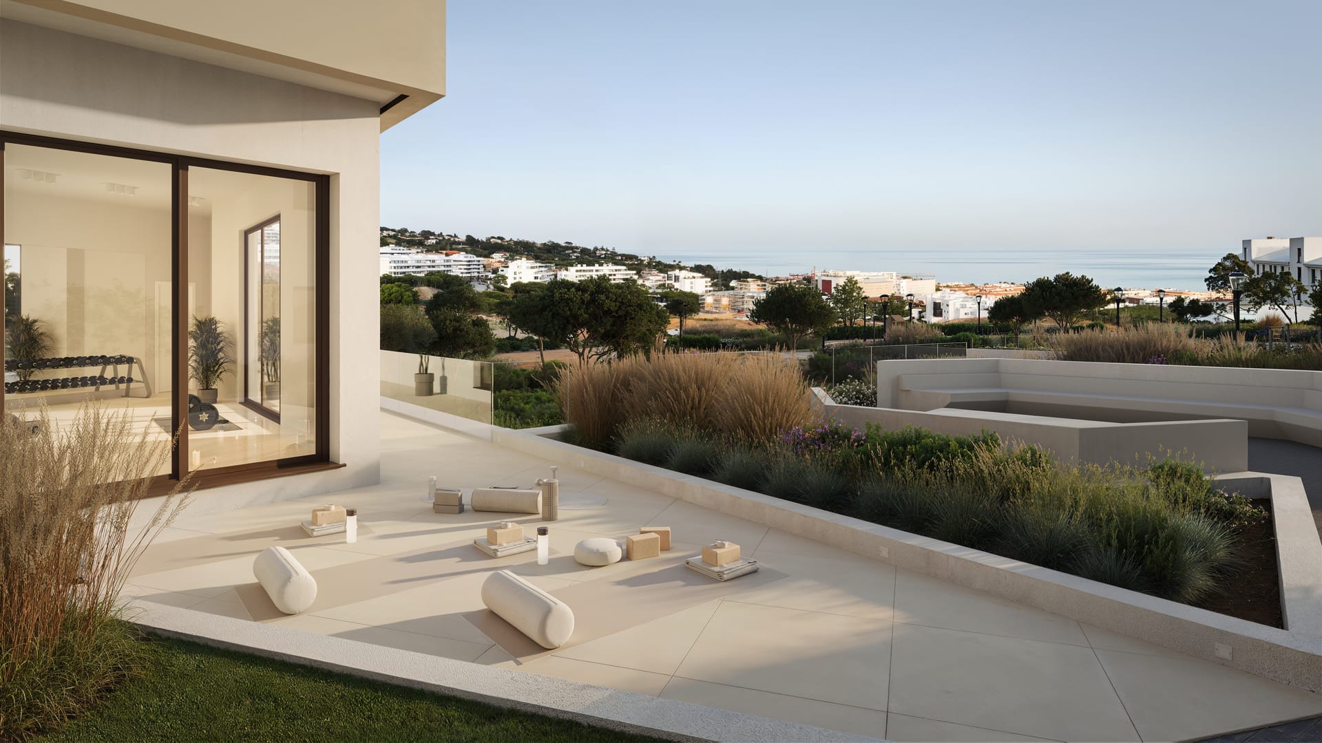 The outdoor yoga deck beside the gym, looking down over the coast to the sea. Kala Residences, El Higuerón, Fuengirola.