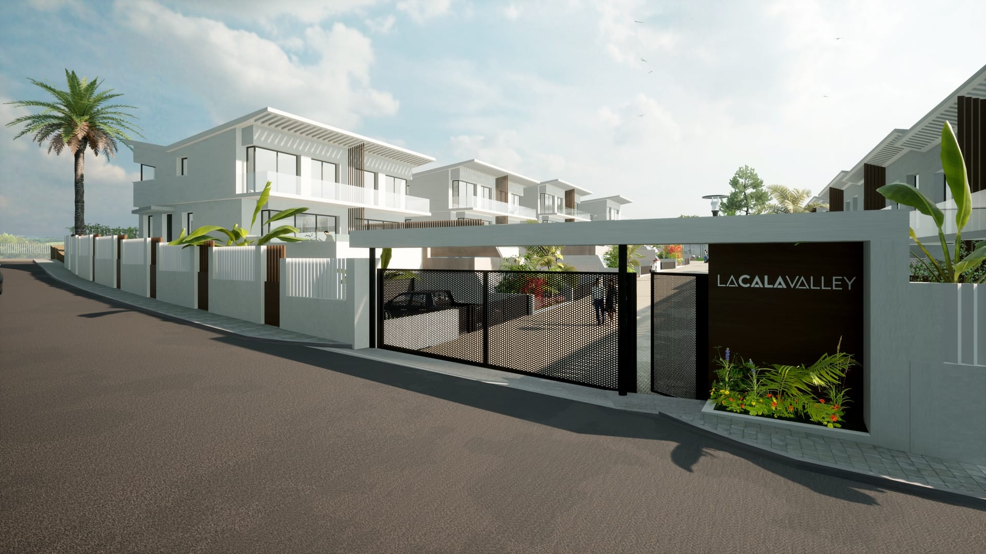 The gated entrance, with the name of the development on the wall beside it. La Cala Valley, Lagar Martel, Mijas.