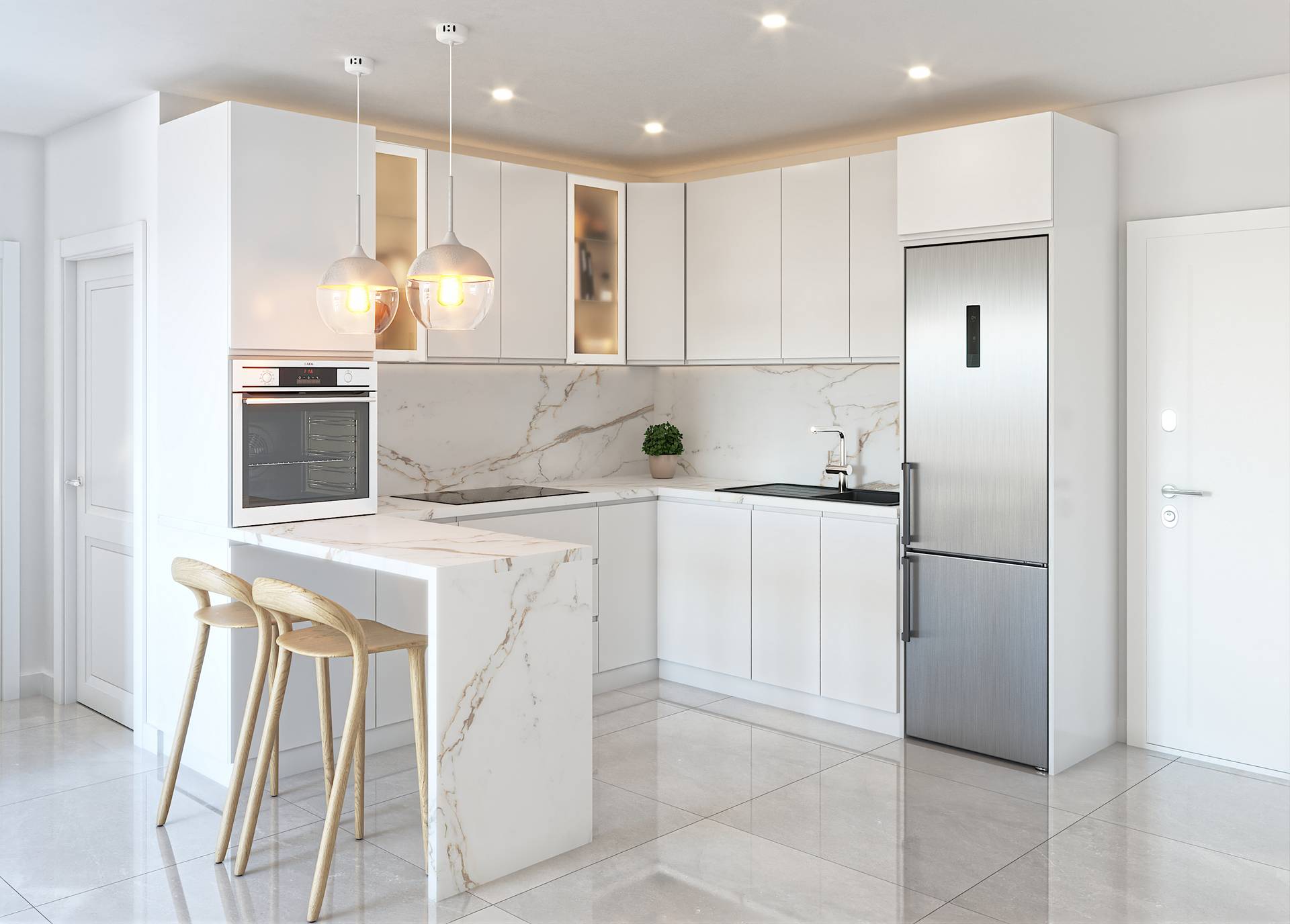 A white kitchen with an island in grey-veined porcelain, two stools, a built-in oven and a fridge-freezer. Laguna Nova, Las Lagunas, Mijas.