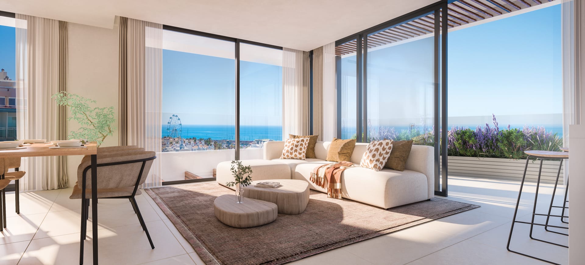 A living room with glass on two sides and the sea beyond. Marina Golden Bay, Benalmádena Costa, Benalmádena.
