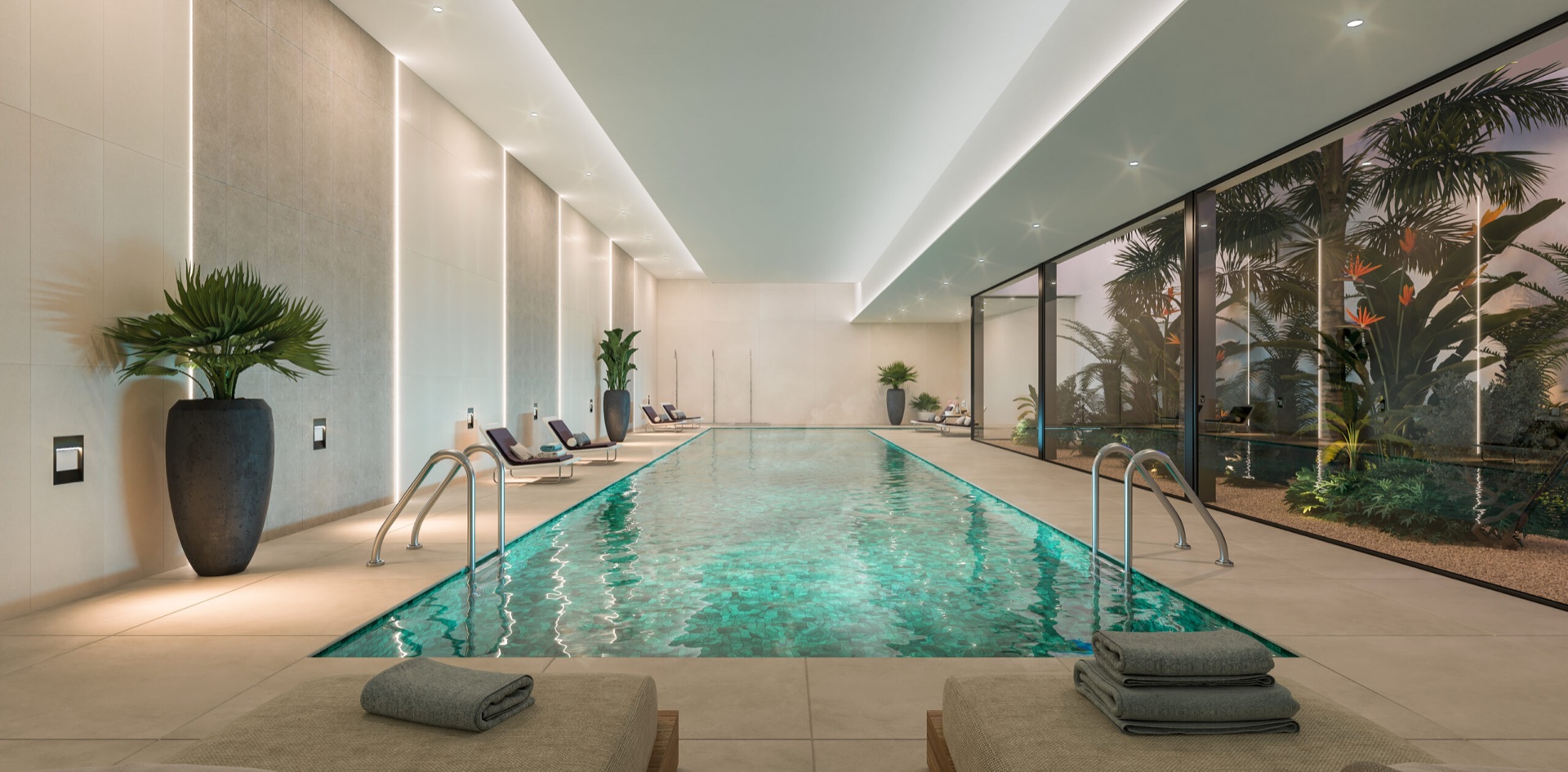 The indoor lap pool, glazed along one side onto a small planted courtyard. Origin, Altos de los Monteros, Marbella.