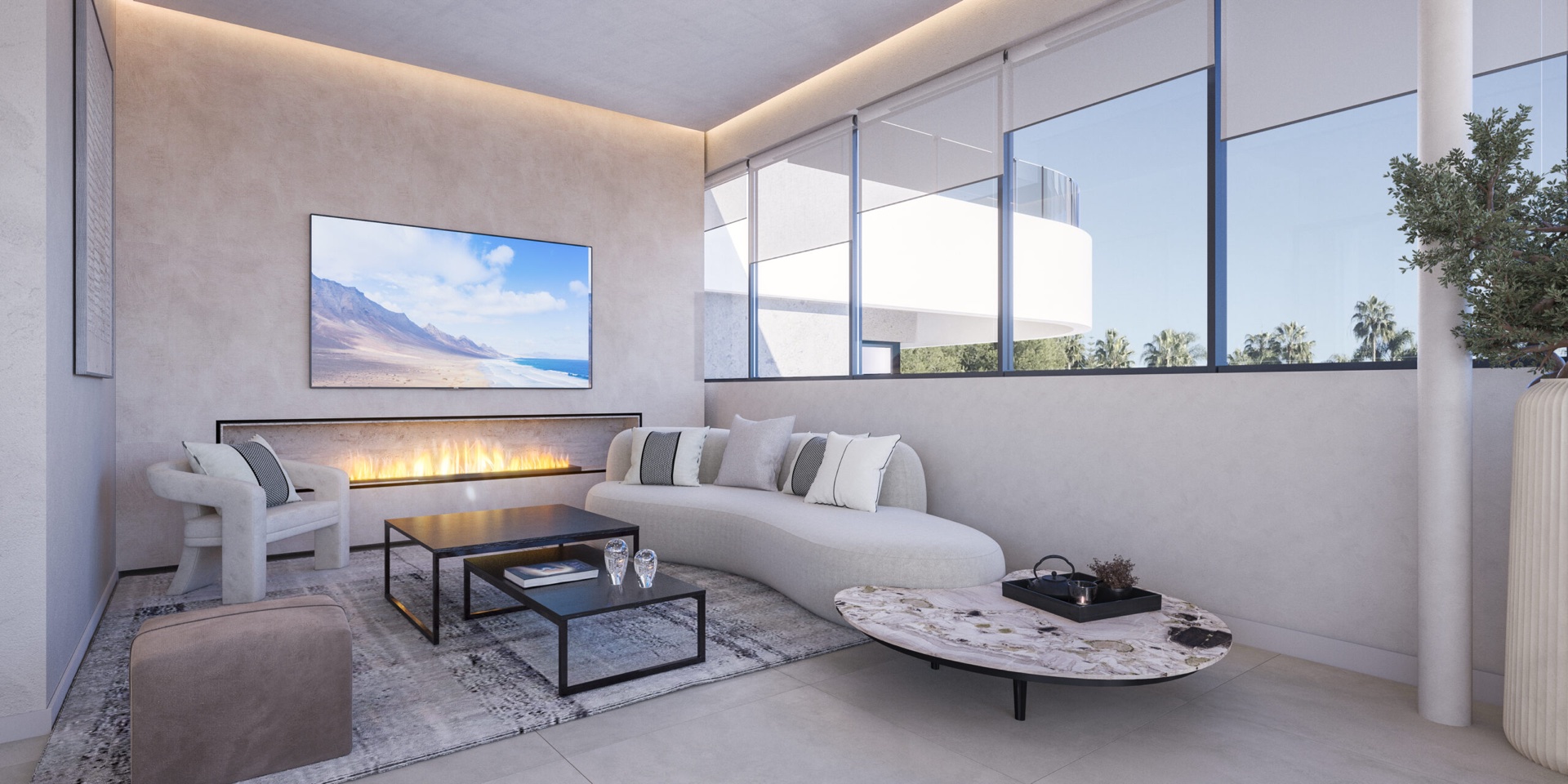 The residents’ lounge, with a built-in fire and a wall-mounted screen. Origin, Altos de los Monteros, Marbella.