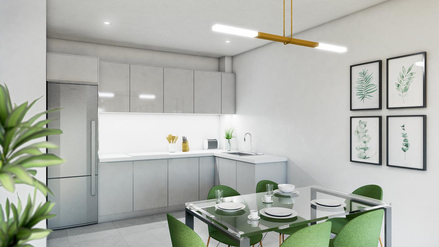 The kitchen, with grey lacquered units and the dining table beside it. Residencial Sunhill, Los Pacos, Fuengirola.