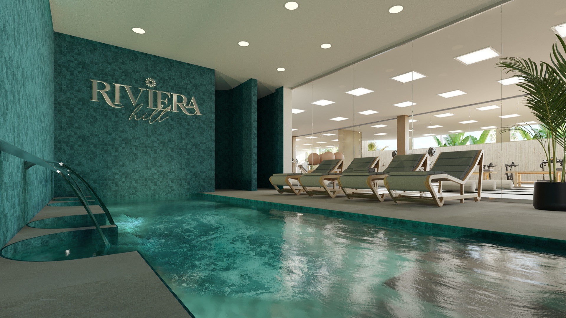 The heated indoor pool, with loungers along one side and the gym behind a glass wall. Riviera Hill, Riviera del Sol, Mijas.