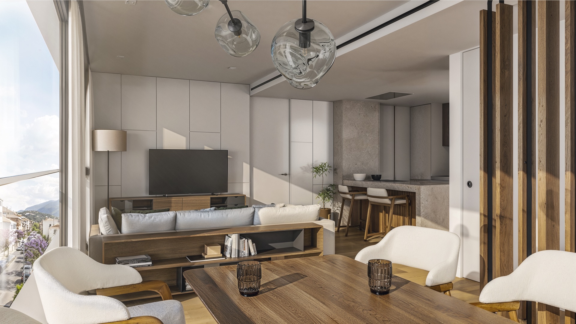 A living room open to the kitchen, with a dining table and glass doors out to the terrace. San Lorenzo 52, Avenida San Lorenzo, Estepona.