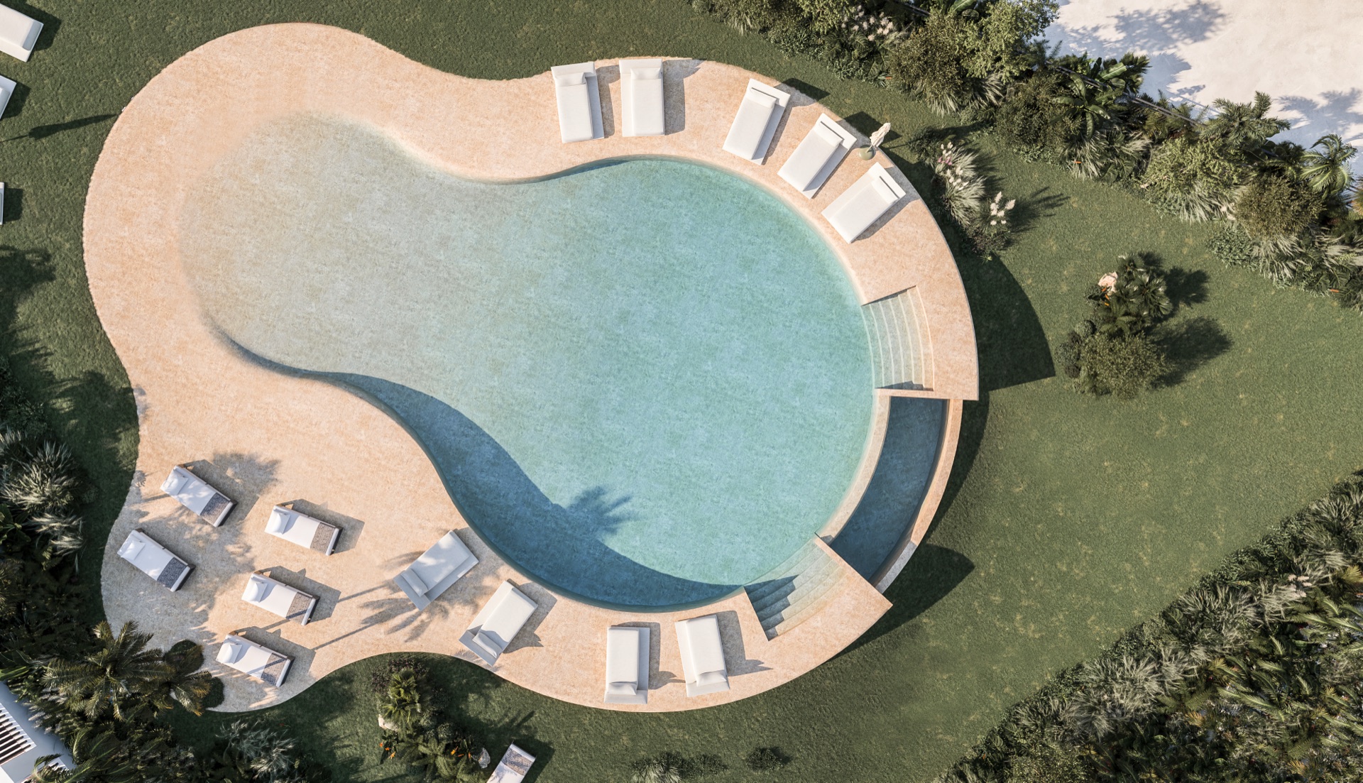 The saltwater pool seen from above, with sunbeds on a sand-coloured deck, a shallow end that slopes gently into the water and lawn around it. Solaia Residence, Cancelada, Estepona.