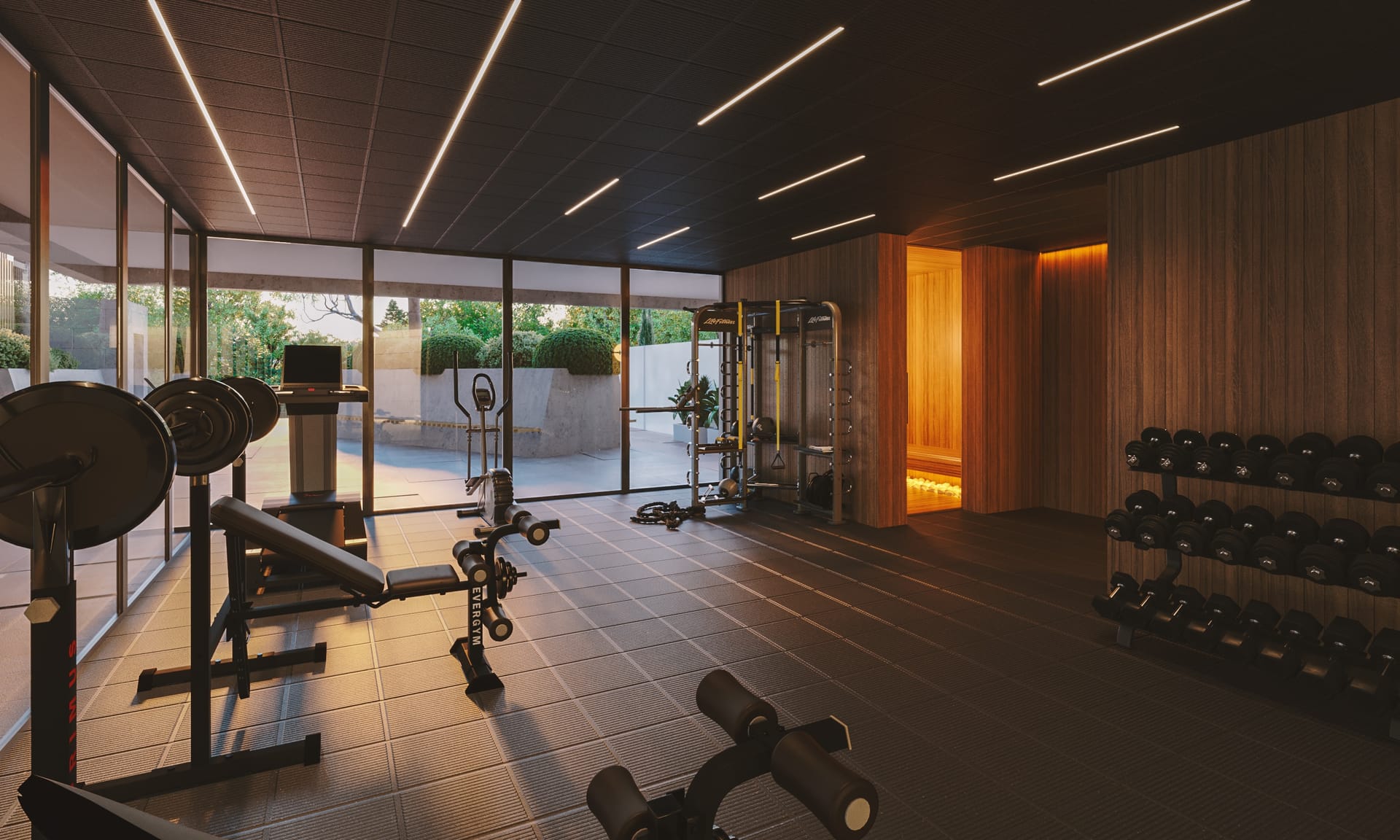The gym, with weights and machines in front of a wall of glass. Torreblanca Heights, Torreblanca, Fuengirola.