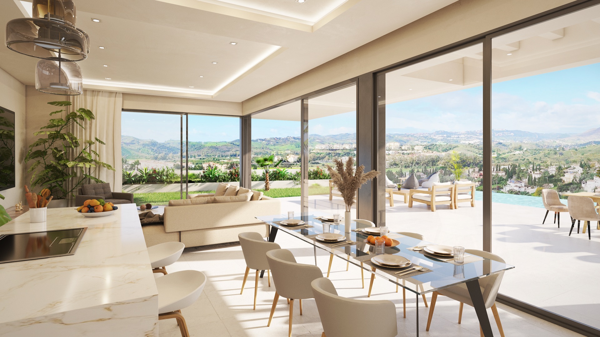 The kitchen, dining area and living room in one space, with a marble-effect island and floor-to-ceiling glass onto the pool terrace. Villa Oriana, Mijas Golf, Mijas.