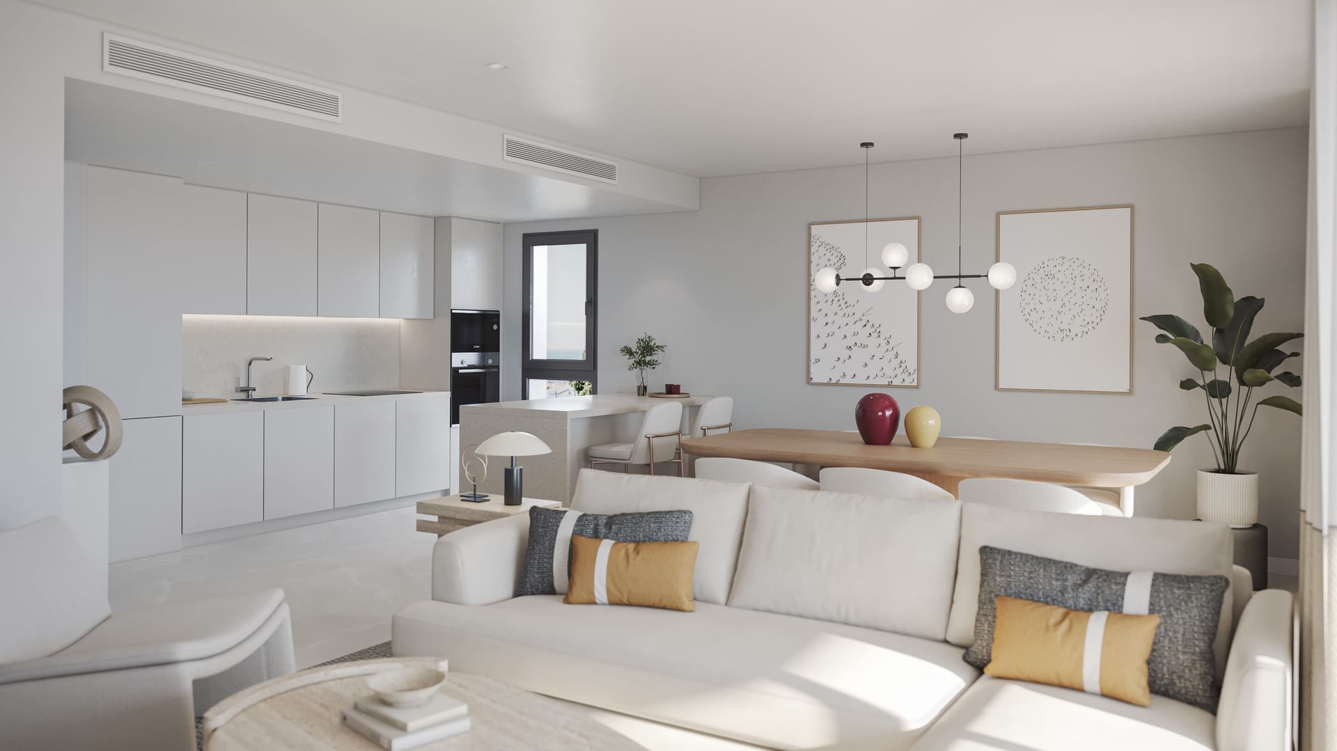 A living room open to a white fitted kitchen, with a dining table between them. Zenity Blau II, La Gaspara, Estepona.